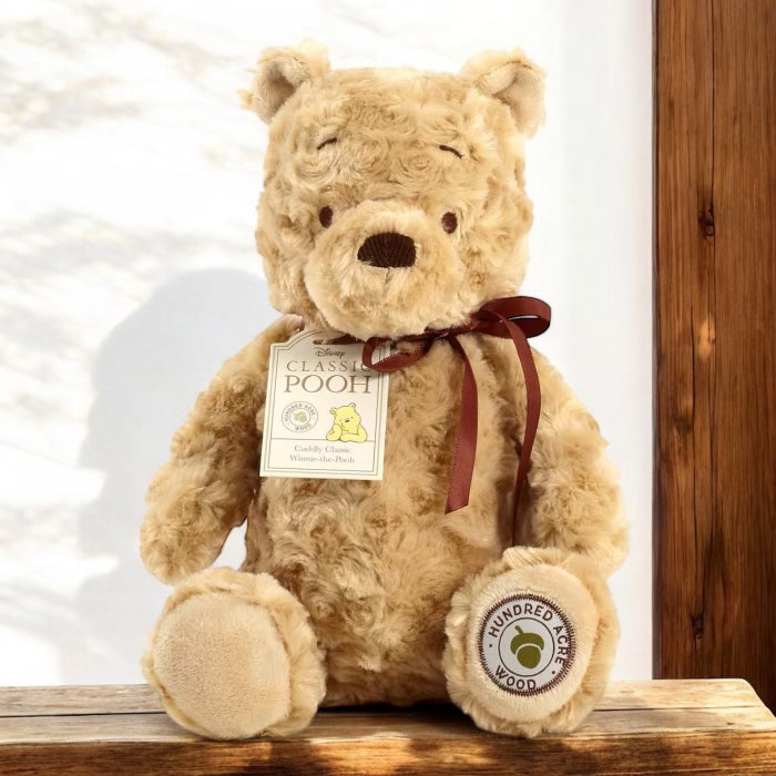 Pooh bear soft toy on sale